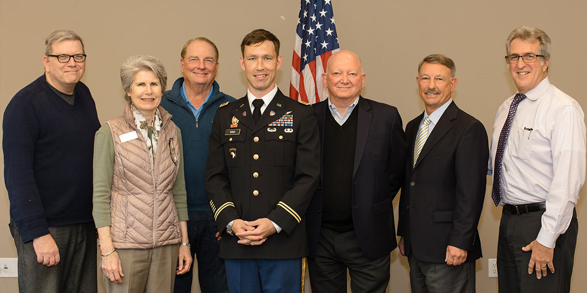 Justin Winn with family and  Concordia University Irvine professors